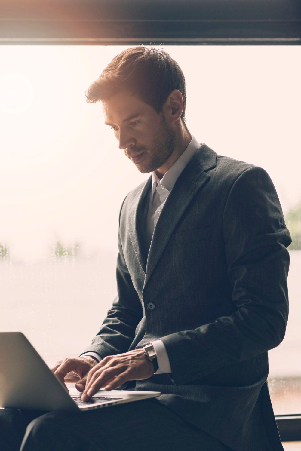 A candidate on the computer looking for job opportunities.